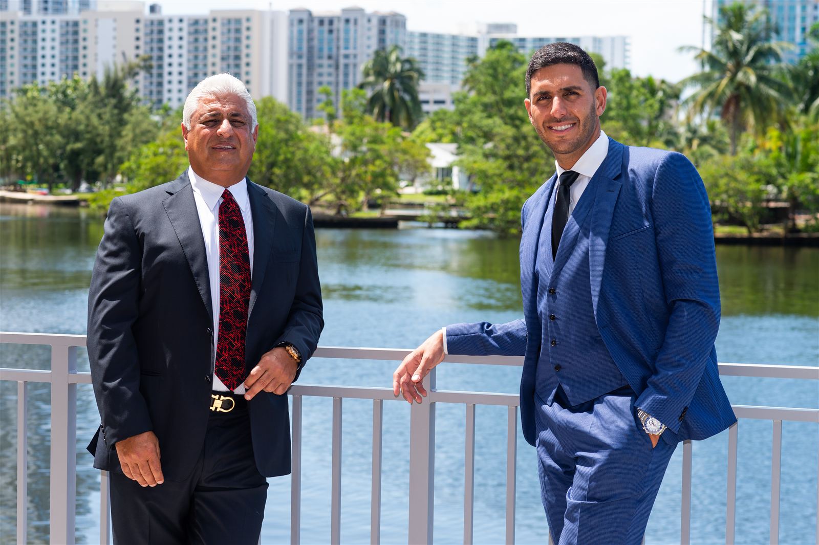 Yosi and Guy Gil on a waterfront terrace in Sunny Isles Beach