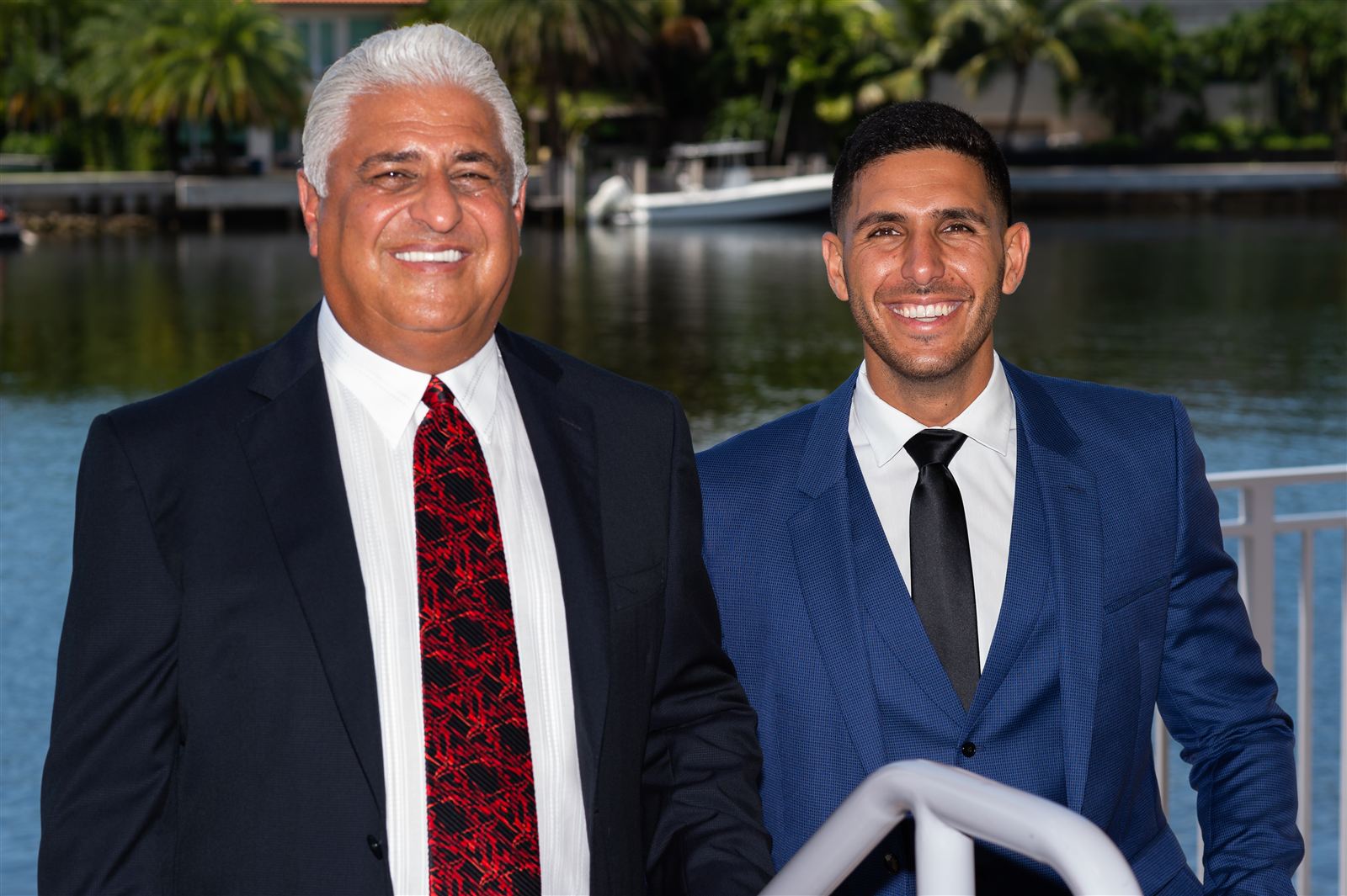 Yosi and Guy Gil by the water, close up